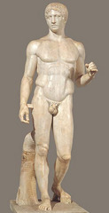 34. Doryphoros (Spear Bearer)
Location: Herculaneum
Artist: Polykleitos
Date: 450-440 B.C.E.
Culture: 
Period/Style: Greek; Classical realism; contrapposto
Medium/Material: Roman copy: marble; Greek original: bronze
Theme(s):
Form: Form, to give a three-dimensional feel; to create shadows
Function: Depiction of the (ideal) human body
Content: Contrapposto, realism, muscular, iconic, balanced portions of the human body
Context: