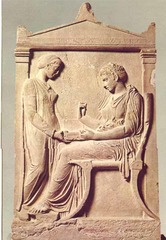 36. Grave stele of Hegeso. Attributed to Kallimachos. c. 410 B.C.E. Marble and paint.
-Athens, Greece
-High Classical
-relief carving
-servant/slave girl holds out box to older/more mature woman on a klismos (chair) with feet elevated, older woman holds up necklace
-made to adorn the grave of Hegeso
-shows Hegeso's status and power (hierarchy of scale, necklace, and servant with poorer dress), shown positively to celebrate life after death 
-themes: contrast between classes, respect of the dead
-hyper-realistic, emotionless faces, motionless bodies, daily life (typical of high classical art)
-context: women secluded to home, extremely wealthy father (mentioned in epitaph), patriarchal society
