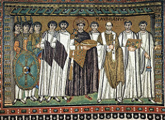 51b. Justinian and Attendants
Location: San Vitale; Ravenna, Italy
Date: c. 547 C.E.
Period/Style: Early Byzantine
Medium/Material: mosaic
Theme(s): authority, unity between state and church
Form: symmetrical and frontal, figures have no volume, float, overlap, minimal background
Function: to depict Justinian and his attendants participating in the Mass
Content: dressed in royal purple and gold, holds a paten, Archbishop Maximianus identified, Halos indicate saintliness
Context: Banker Julianus Argentarius financed the building of San Vitale
Cross Cultural Connection(s): Alexander Mosaic