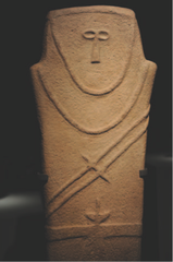Anthropomorphic Stele

Arabian Peninsula, 4000 B.C.E.
Sandstone

3 ft. tall, sculpted, emphasis on front with chest, head, and nose
Necklace hangs with two diagonal chords across the body with a tool attached
Double bladed dagger hangs from belt that wraps figures body
Figure seems to be abstract but is anthropomorphic, showing a human form but not actually human
Very stylized representation of a human form