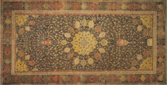 Ardabil Carpet

Maqsud of Kashan, 1539-1540 Silk/Wook

Oldest dated islamic carpet in existence
Part of a matching pair put in the funerary mosque of Shayik Safial-Din, 
Used as a prayer carpet, covered in geometric patterns,vegetative/floral forms 
Medallion in center represents the inside of the dome that was above it, and it had 16 pendentives
Masque lamps hang from two of the pendentives, one smaller and closer, while the other one is larger and farther away from the center
Corner squinches have pendants completing the feeling of looking into a dome
Wool carpet, woven by ten people, (probably men as women didnt weave in this period), importance of location and size of product shows men were the only ones who could be trusted to produce it