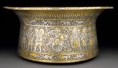 Basin (Baptistere de St. Louis) Muhammad ibn al-Zain. 1320-1340ce brass inlaid with gold and silver