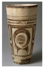 Beaker with Ibex motifs

Susa Iran, 4200-3500 B.C.E
Painted terra cotta

Found near burial site, one of first ceramic pieces
Use of potters wheel and thin design was result of it
Stylized aquatic birds at top, stylized dogs below, central ibex portrayed
Ibex has oversized horns that give it an abstract quality
Middle has clan symbol of family ownership showing that the deceased belonged to a certain family
Geometric, linear, and curved forms balance each other