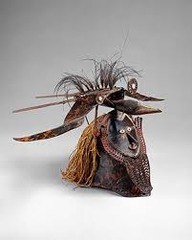 Buk (mask)
Mabuiag Island
mid to late 19th century
turtle shell, wood, cassowary feathers, fiber, resin, shell, paint

bottom human face
middle face/body of bird
top feathers
many pieces
representation of hero, ancestor, totem
used at masquerade ceremonies
connection to supernatural