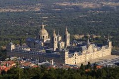 *Escorial*
*Juan de Herrera*
Madrid, Spain
1563-1584
16th Century Spanish

Wanted a more streamlined palace. Mausoleum, monastery, church, palace. 3 entryways, Italian pediments. Grid-like. Massive church in middle. Grid commemorates gridiron where St. Lawrence was martyred.