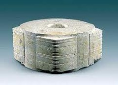 ID: Carved Jade
Form: carved out of jade to have a fubular center and squared-off corners, edges decorated with decorative paintings
Function: use is unclear, might have held a spiritual meaning
Content: important for their culture
Context: Chinese neolithic art