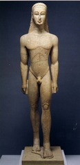 Kouros (male figure), from Attica (600 B.C.) ~ Archaic Sculpture

Left foot forward, abstract hair, nude, large head, reminiscent of Egyptian and Near East statuaries.
