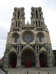 laon cathedral. 1190. groin ribbed vaulting. six partite ribbed vaulting. square shapes made in the aisle. single piers and compound piers. four story elevation. first level nave arcade. second level gallery. thrid level triforium. and fourth story is the clerestory. has crossing tower.