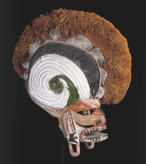 Malagan display and mask. New Ireland Province, Papua New Guinea. c. 20th century C.E. Wood, pigment, fiber, and shell.