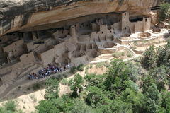 Mesa Verde Cliff Dwelling

Montezuma County, Colorado, Anasazi, 450-1300 C.E., Sandstone

Pueblos built into the side of cliffs, housed about 250 people
Clans moved together for mutual support and defense
Top-ledge stores all supplies, cool/dry area out of way only accessible by ladder
Plaza in front of abode structure; kivas face the plaza
each family recevied one room in the dwelling
Farming done on plateau above the pueblo everything had to be imported into the structure including water.