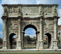 Name: Arch of Constantine

Date: 315 CE (Empire)

Medium: Marble

Location: Roman Empire

Artist: Unknown

Form: Triple passageway arch, rejection of classical traditions (except what was stolen), mechanical rigidity, stocky figures

Function: To show that Constantine was a benevolent ruler

Content: Decorations stolen from other monuments

Context: Most of the decoration was taken from earlier monuments because Constantine was worried about being assassinated and didn't have time to build it any other way.