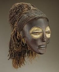 Name: Female Pwo Mask

Date: Late 19th - early 20th Century CE

Medium: wood, fiber, pigment, metal

Location: Democratic Republic of the Congo

Artist: Chokwe peoples

Form: female ancestral mask, made of available resources, very stylized with what the Chokwe people saw as 