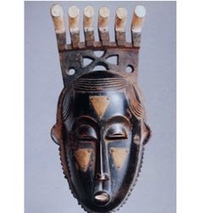Name: Portrait mask (Mblo)

Date: Early 1900s

Medium: Wood and pigment

Location: Cote d'Ivoire

Artist: Baule peoples

Form: beads and nails added for decor and texture,

Function: Used in ceremonial dances to celebrate specific members of the community or ancestors

Content: Idealized figure - broad forehead, long nose, pronounced eye sockets, these features depict intellect and beauty under the Baule standards; introspective (inward look), peaceful; male and female masks

Context: Real people depicted in masks - rare in African art