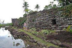 Nan Madol 


Anciety city that acted as the capital of the Saudeleur Dynastoy of Micronesia
92 small artificial islands connected by canals, about 170 acres total
Built out into the water on a lagoon 
Seawalls act as breakwaters, 15 feet high, 35 feet thick
Canals flushed clean with ties
Islands arranged SW toNE to take advantage of trade winds
City built to separate upper/lower classes
King arranged for upper classes to live close to him, keep eye on them
Curved outer walls point upward at edges giving complex symbolic boat like appearance