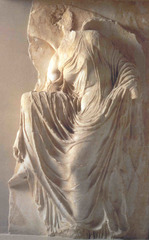 Nike Adjusting her Sandal
c. 410 BCE; 
Period: Classical Greek
From the temple of Athena Nike, by the Parthenon, deeply incised drapery lines reveal the body, wet drapery.