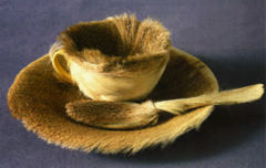 Object (Le Dejeuner en Forrure)

Maret Opennheim, 1936, Fur Covered cup, saucer and spoon

Said to have ben done in response to Picasso's claim that anything looks good in fur
Comination of unlike objects, fur and tea set
Erotic overtones ????
An assemblage
Cominaed traditionally female genteel objects vs. masculintiy of sculpture done in hard surfaces in great scale and made vertically
Chosen by visitors of a Surrealist show in New York as the quintessential Surrealist piece
Fame came to her young as she was 22 when she produced this work, and this allowed her to grow as an artist