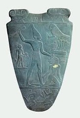 *Palette of King Narmer (front)*
3000-2920 BC
Hierakonpolis, Egypt
Predynastic
Slate

One of the earliest historical (as opposed to prehistorical) pieces of art. Used to hold eye makeup. Top shows Hathor and the hieroglyph for Narmer. There is a falcon on a papyrus blossom, which represents Lower Egypt. The left shows a servant holding a pair of footwear. The center shows Narmer, wearing the crown of Upper Egypt BTSing a person who probabli didn't want unification. The bottom shows defeated enemies.