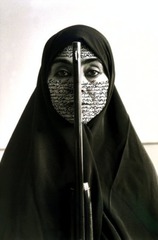 Rebellious Silence

Cynthia Preston, Ink on Photograph, 1994

- Iranian-born artist
- black and white photograph
- woman is wearing a chador (like a cloak) that only allows the face and hands of iranian women to be seen
- chadors avoids women's bodies being seen as sexual objects
- poem on face written in Farsi expressed piety
- iranian woman who wrote the poem writes on gender issues
- gun divides body into dark and light side
- gun=ominous tension
- westerners view the work as female oppression
- work could be viewed as woman who is ready to die defending her faith and customs