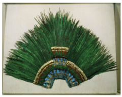 Ruler's headdress of Motecuhzoma II

Aztec, 1428-1520, Feathers and gold

400 long green feathers are tails of sacred quetzal birds, male birds produce only two such feathers each
400 symbolizes eternity
Only known feather headdress worldwide
Probably part of collection of artifacts given by montezuma to Cortez for Charles V the Holy Roman Emperor