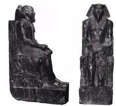 *Seated Statue of Khafre*
2520-2494 BC
Gizeh, Egypt 
Old Kingdom
Diorite

The diorite was brought 700 miles so that it could be carved. These are the only organic forms in Khafre's temple, contrasting with the geometric temple. Intertwined papyrus and lotus are carved between the throne's legs, which is the symbol of unified Egypt. The falcon of Horus is behind Khafre's head, indicating his divine status. He wears the *nemes* headdress with the *uraeus* cobra in front of it. The pose is bilaterally symetrical. Finishing was done by abrasion