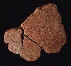 Terra Cotta Fragment

Lapita, Reef Islands, 1000 B.C.E.
Terra Cotta

Human face with intricate geometric designs 
Use of curved stamp like patterns
One of earliest representations of human face in Pacific
Lapita people known for pottery work