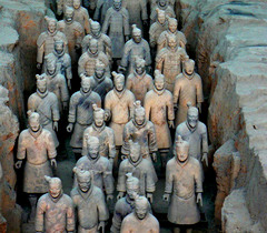 Terra cotta warriors from mausoleum of the first Qin emperor of China 
Qin Dynasty. c. 221-209 B.C.E. Painted terra cotta 
One of the most extraordinary features of the terracotta warriors is that each appears to have distinct features—an incredible feat of craftsmanship and production. Despite the custom construction of these figures, studies of their proportions reveal that their frames were created using an assembly production system that paved the way for advances in mass production and commerce.