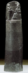 The Code of Hammurabi

Babylon, 1792-1750 B.C.E.
Basalt

Earliest law code ever written and enforced by ruler, used Akkadian language
Sun God Shamash enthroned is handing Hammurabi a rope, ring, and rod symbolizing divine right to rule
Shamash shown with both frontal and profile view
Hammurabi has greeting gesture, figures stare at each other despite shoulders being frontal
300 laws below narrative as these were the laws given to Hammurabi to enforce