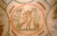 *Title:* Good Shepherd Medallion

*Artist:*

*Period/Style:* Late Antique / Early Christian

*Date:* 200-400 CE

*Patron:*

*Original Location:* Orant Fresco, Greek Chapel, Catacomb of Priscilla, Rome

*Material:* paint on volcanic rock

*Subject:* male sheep (rams) but no horns b/c baby rams and don't want to mistake them for goats (goats are bad)

*Technique and Description:*
-fresco
-medallion
-lunettes (surrounding medallion)
-funerary and didactic functions

*Context:*
-surrounded by lunettes
-According to St. Paul, God sacrificed Jesus to erase the original sin started with Adam and Eve's actions
-Early Christian art looks very Roman (evidence of syncretism/appropriation in art; also likely bc Jews didn't make art to mimic so turned to secular inspirations), was somewhat private (open to Christians but hidden b/c perfection), combination of naturalism and abstraction, had funerary and didactic functions
-start breaking 2nd Commandment b/c a lot of people illiterate

*Message/Meaning:*
-Jesus = 