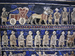 Title: Standard of Ur
Artist: Sumerians
Period/Style:
Date: 2600 BCE
Patron:
Original Location: Iraq
Material: 3-dimensional trapezoid.
Subject: 2, 3-register panels of victory of war and then celebration
Technique & Description: 1st Panel Victory of War--1st register: big man going outside register/narrative. 2nd register: naked prisoners of war. 3rd register: chariots and horses trampling people. 2nd Panel Celebration of Victory--1st register: Big man, party, music, drinking. 2nd register: Bringing food to the party. 3rd register: Getting the food to bring to the party (Maybe the defeated paying taxes)
Context: Time of interaction/aggression with other groups/city-states
Meaning: