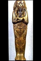 Tutankhamun's tomb, innermost coffin. New Kingdom, 18th Dynasty. c. 1323 B.C.E. Gold with inlay of enamel and semiprecious stones.