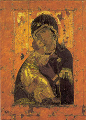 Vladimir Virgin. Characteristic Byzantine traits; long nose, tiny adult baby. Much more tender portrayal of the Virgin