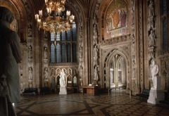 Westminster Central Lobby 

Placed between the House of Commons and House of Lords
Meant to be a space where constituents can meet members of their parliament
Metal grills on doorways originally from House of Commons, marked the spot where women could be seated to watch Parliament, now symbols of the suffrage movement
Central octagonal spaces with statues of past Kings/Queens of England/Scotland
Four large mosaics over each doorway represent four saints of the different areas of the U.K.
St. George is England
St. Andrew is Scotland
St. David is Wales
St. Patrick is Ireland